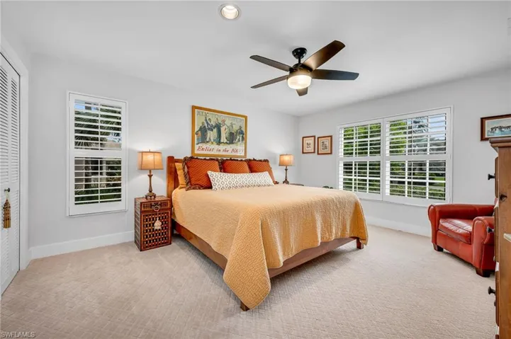 Guest bedroom has new carpet, plantation shutters on windows, and very nice size for your guest to feel truly comfortable