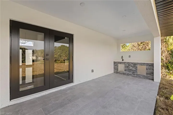 View of patio featuring french doors