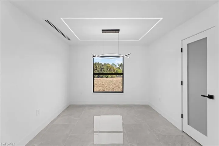 View of tiled spare room