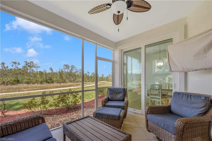 Screened lanai with ceiling fan and TV