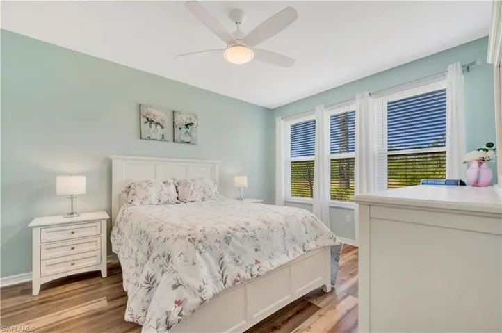 Bedroom featuring a ceiling fan and light wood-style floors