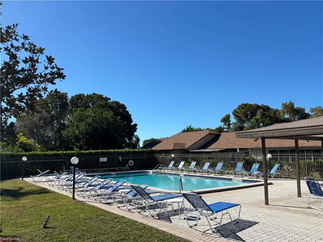 Community pool with a patio area