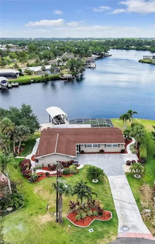 View from above of property with a large body of water