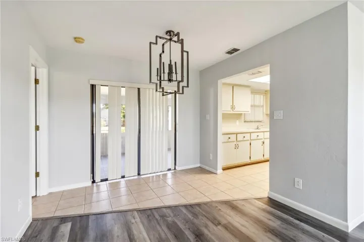 Unfurnished dining area featuring light hardwood / wood-style floors