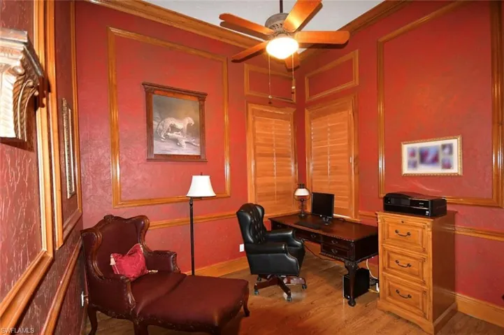 Den/study/office with ornamental wood moldings