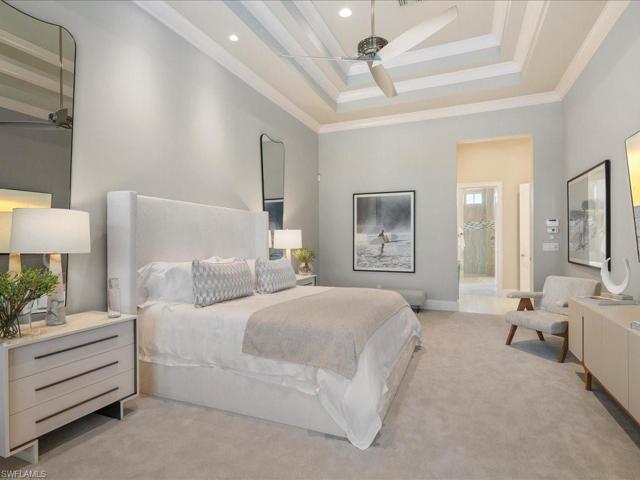Tray ceiling detail complete this primary suite
