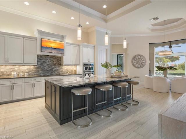 Huge island for gathering in the kitchen, or at the table