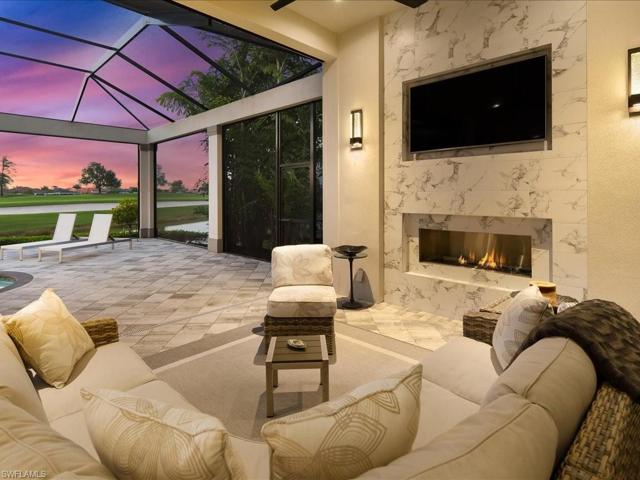 Lanai sitting area complete with fireplace and outdoor TV
