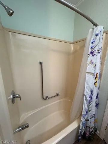 Bathroom featuring shower / tub combo