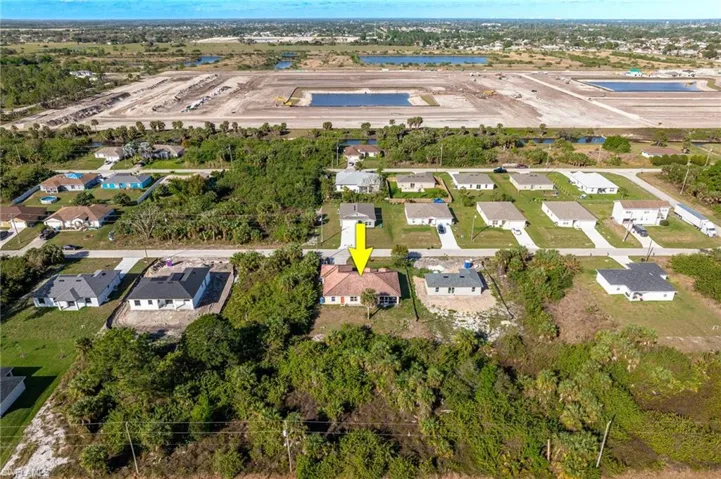 Birds eye view of property with a residential view
