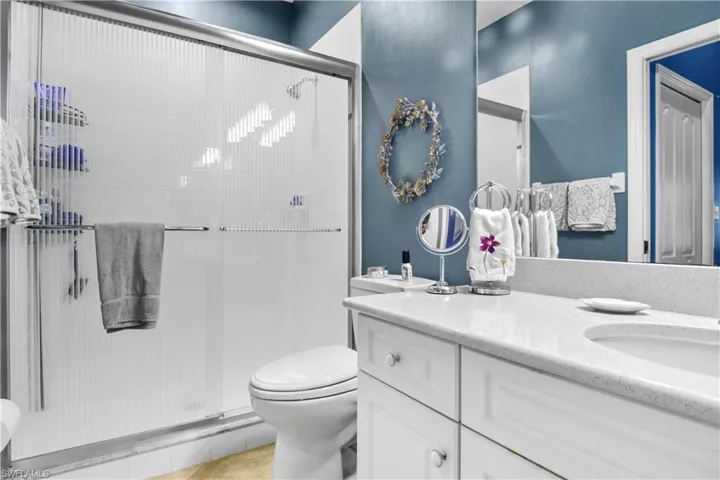 Primary bathroom with walk-in shower.