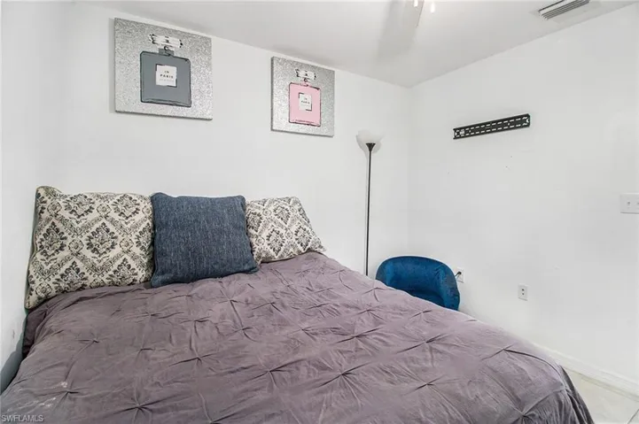 Bedroom featuring baseboards