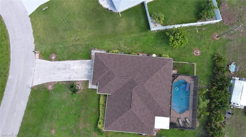 View from above of property featuring a pool area