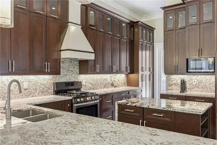 Dual sink, gas stove and island