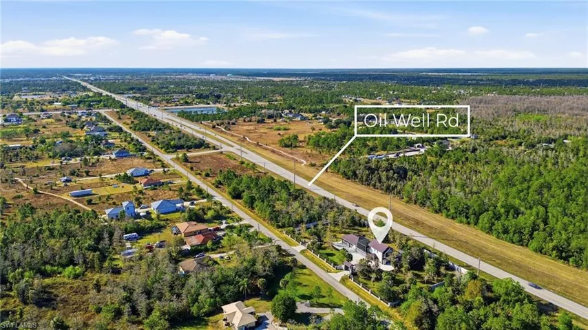 Drone view showing property and Oil Well Rd