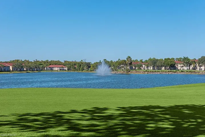 View of golf course and lake from lanai. NW exposure