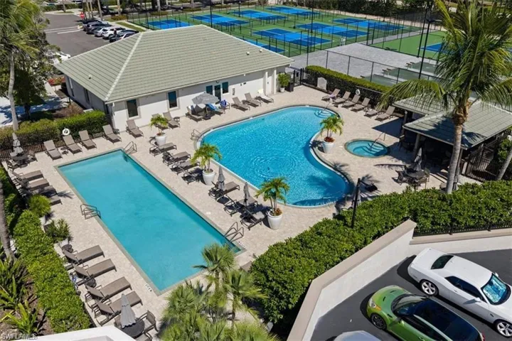 Community pool featuring a patio