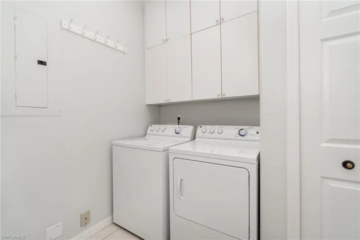 Large laundry room with lots of storage