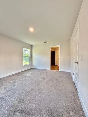 Master Bedroom  room with carpet flooring, baseboards, and visible vents