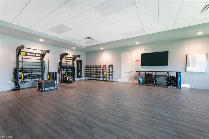 Exercise area featuring a paneled ceiling