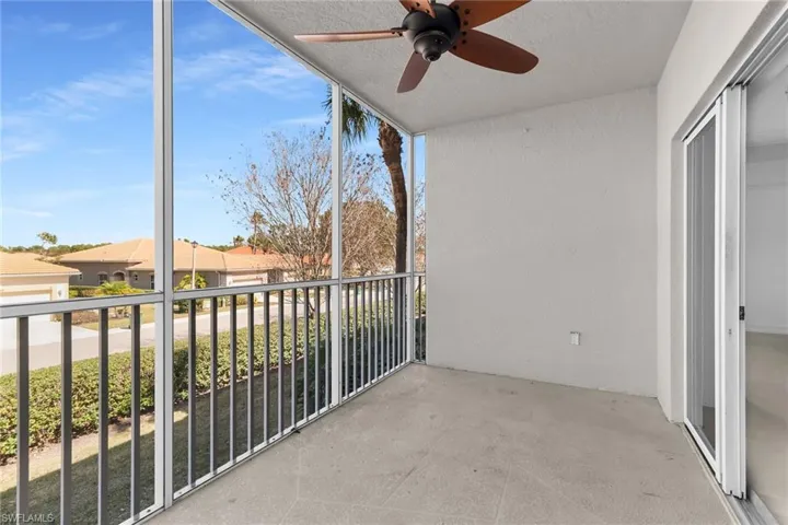 Balcony featuring a ceiling fan
