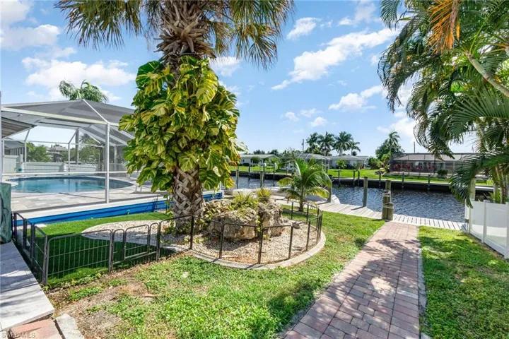 Ideal waterfront setting - step from your pool/lanai to your canal docks and sailboat or powerboat