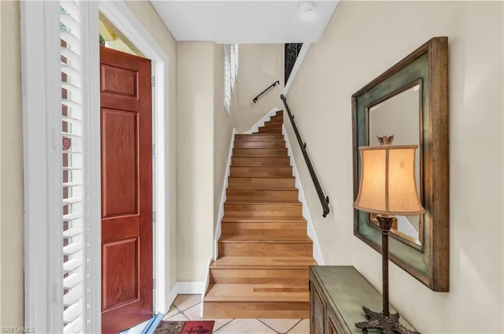 Staircase featuring tile patterned flooring