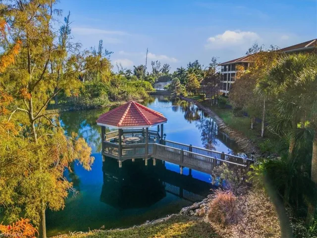Dock with a gazebo and a water view