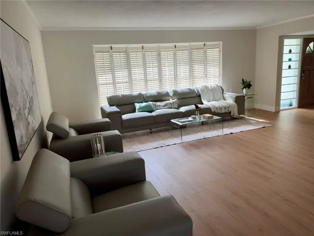 55" TV and modern living room.