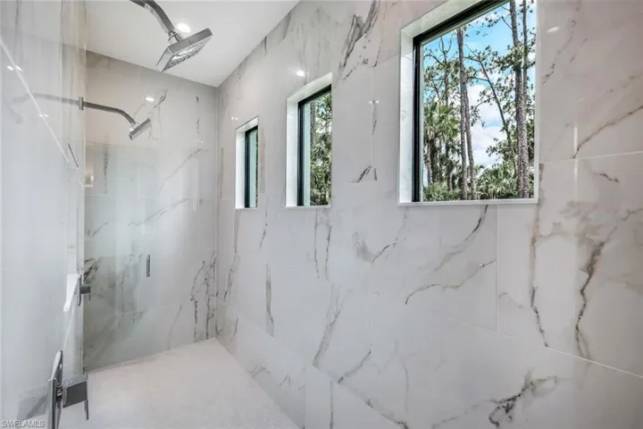 Bathroom with tiled shower