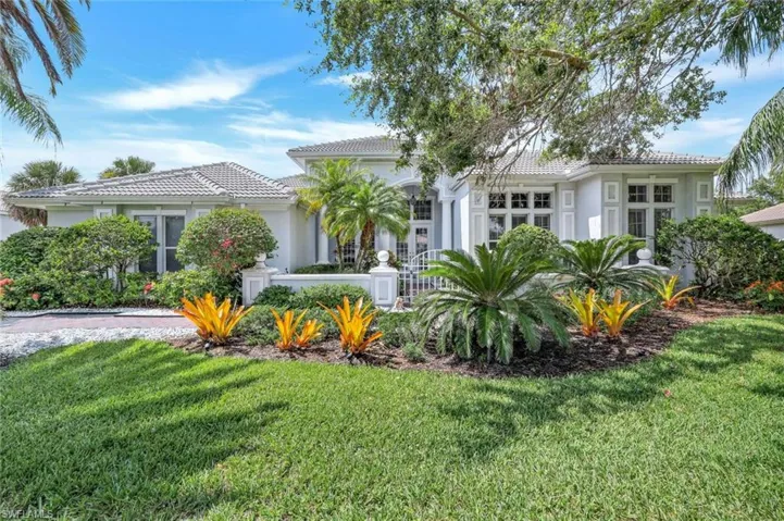 Mediterranean / spanish-style home featuring a front yard