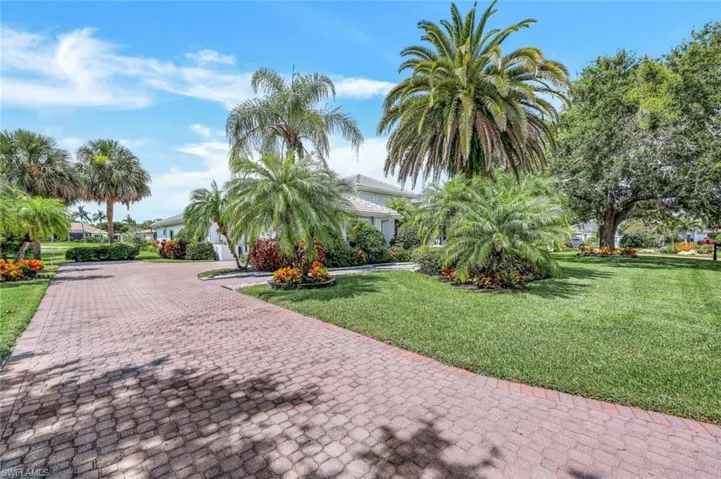 Surrounding community featuring a lawn