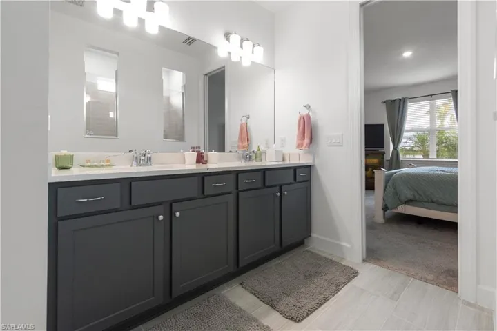 Primary Bath features double sinks and soft close cabinets