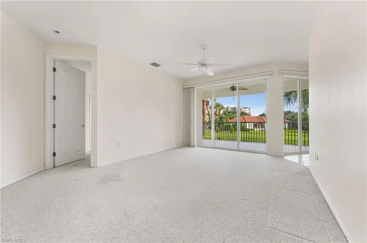 The living area overlooks the 4th tee box.