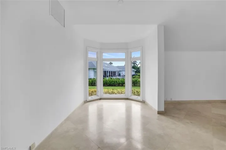 Additional living space featuring baseboards