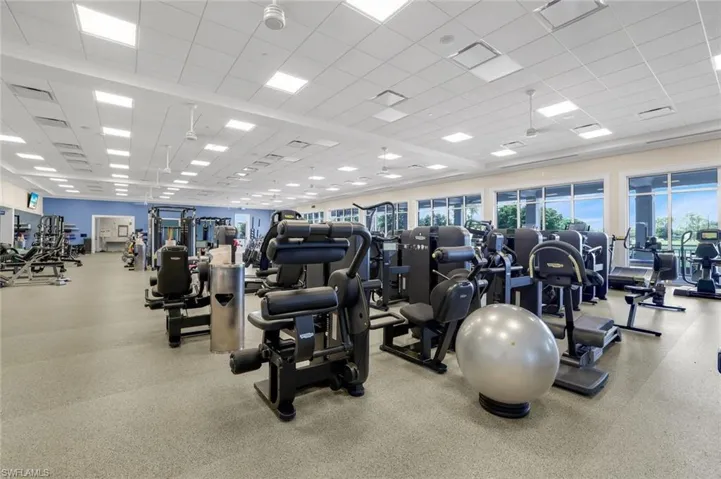 Workout area featuring a paneled ceiling