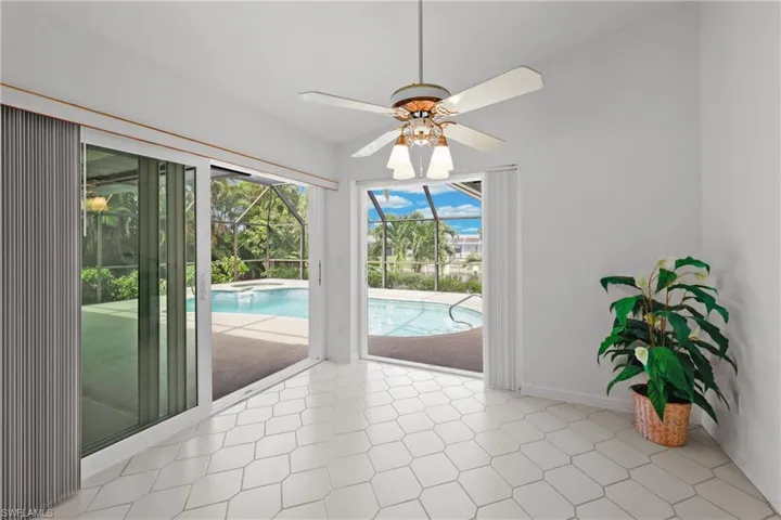 Impact sliding glass doors open wide to bring the outside in!