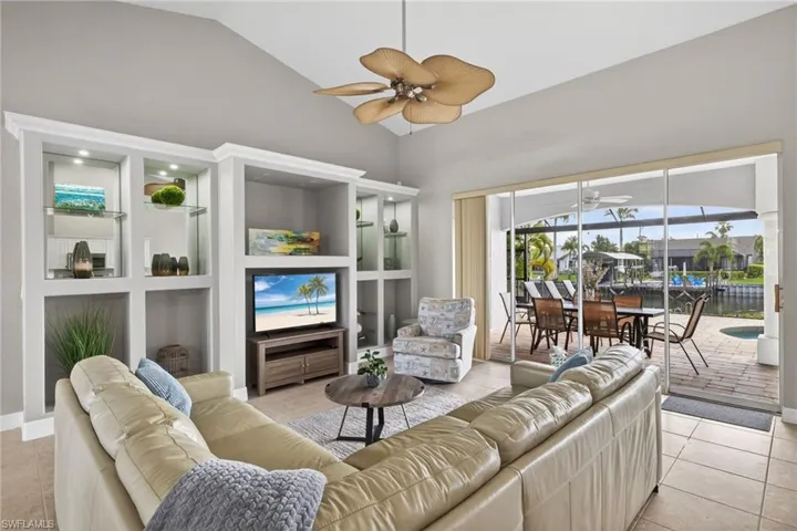 Living area with a a view directly out back when you walk in the door!