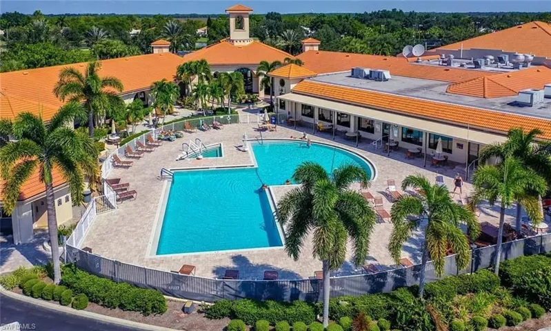 Community pool featuring a patio