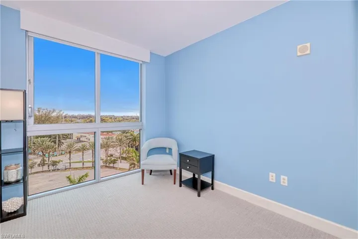 Den room featuring carpet