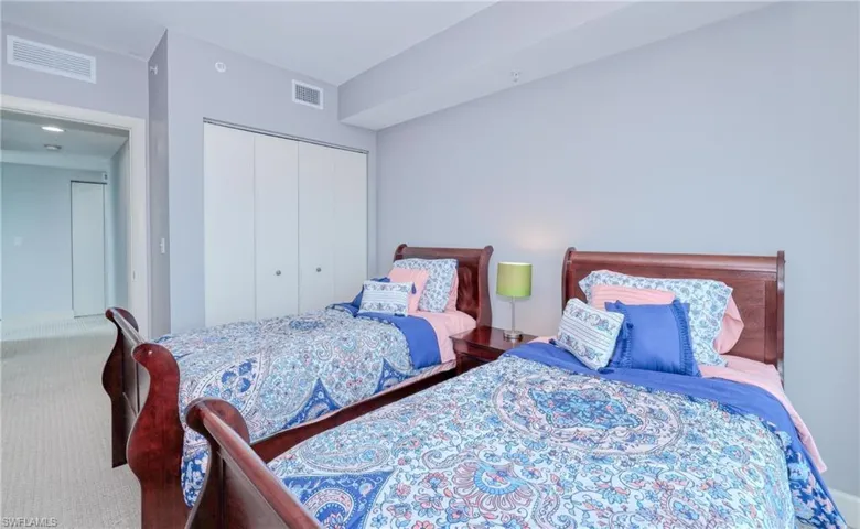Bedroom featuring a closet and carpet