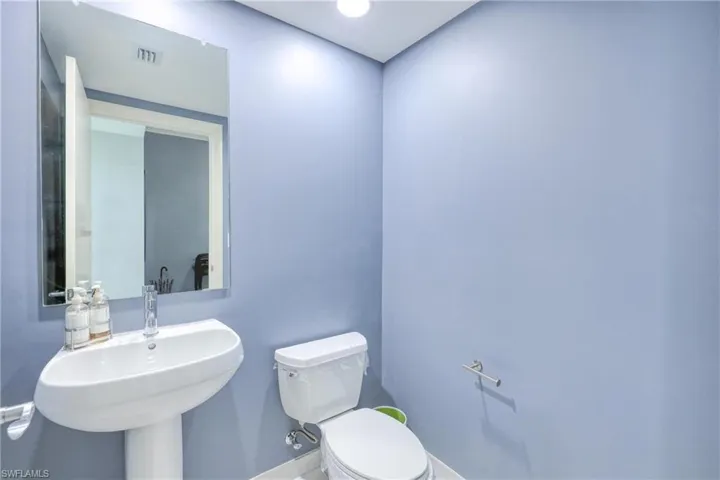 Bathroom featuring toilet and sink