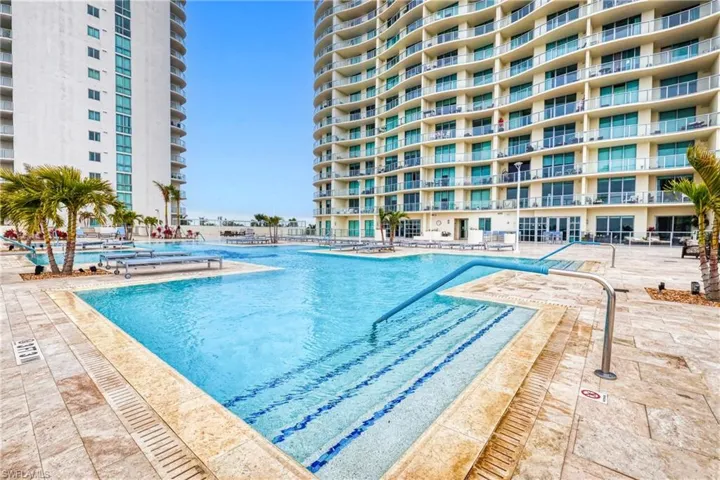 View of swimming pool with a patio area
