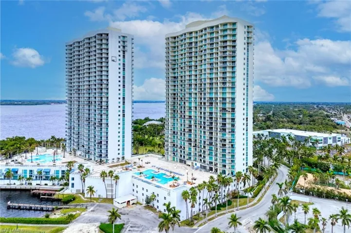 View of property featuring a water view