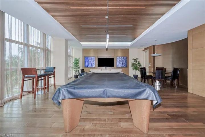 Game room featuring pool table, light wood-type flooring, and wooden ceiling