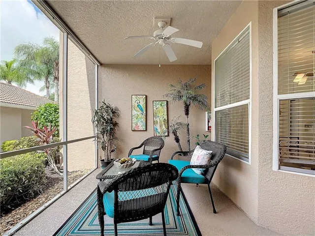 Sunroom / solarium featuring a wealth of natural light and ceiling fan