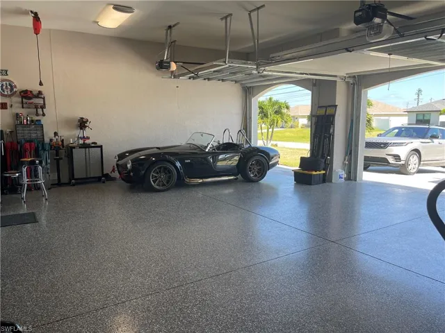 Epoxy Floors, Pull Down Privacy Screen, Space for 3 cars