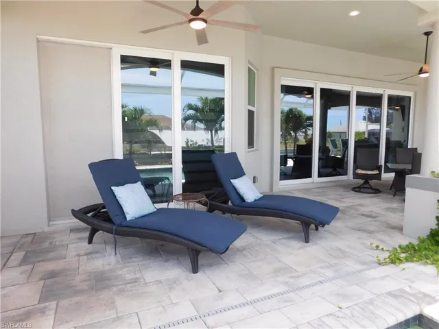 View of patio featuring ceiling fan