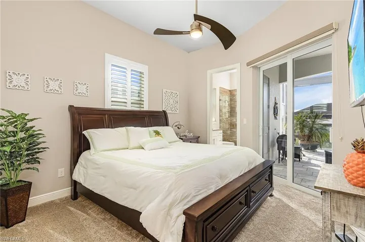 Bedroom 2 with En-suite & Patio Doors leading to Lanai