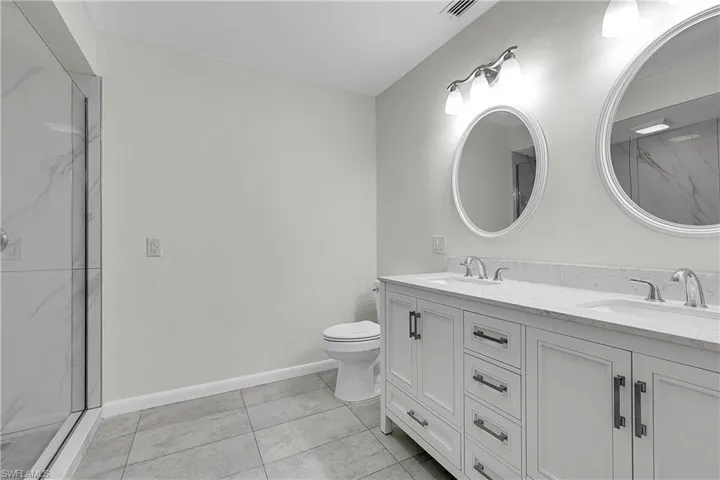 Featuring double sink vanity
